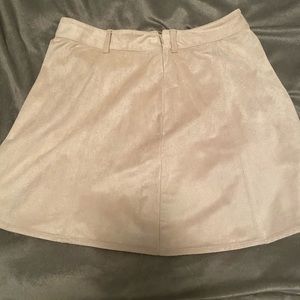 Beautiful soft beige skirt has a glimmer to it